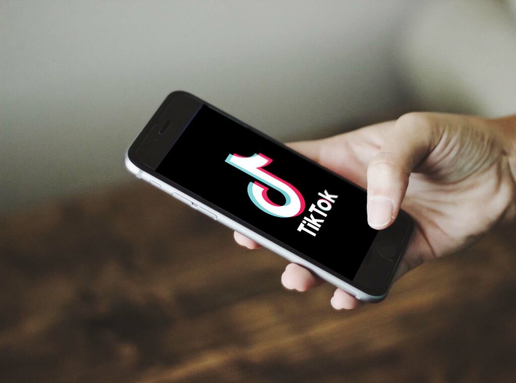 "TikTok on iPhone" by Nordskov Media is marked with CC0 1.0.